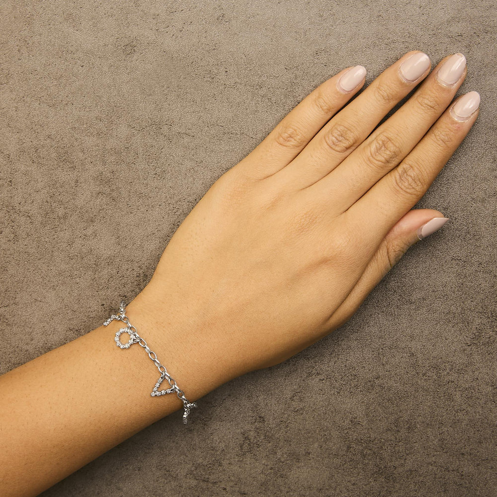 10k White Gold 1/6 Cttw Diamond "Love" Charm Cable Chain Bracelet (H-I Color, I1-I2 Clarity) - 7"