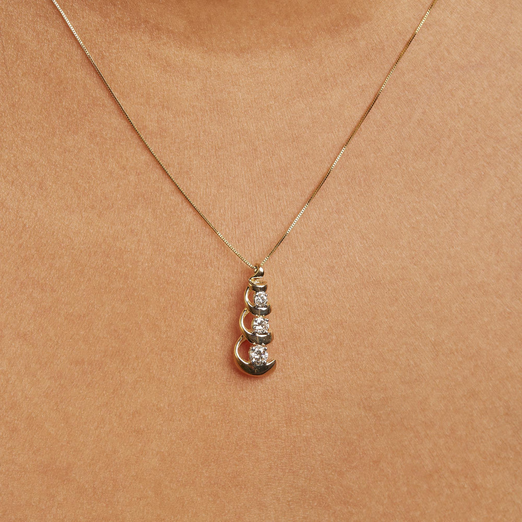 10k Yellow Gold 1/4 Cttw Diamond 3 Stone Swirl and Drop Pendant Necklace