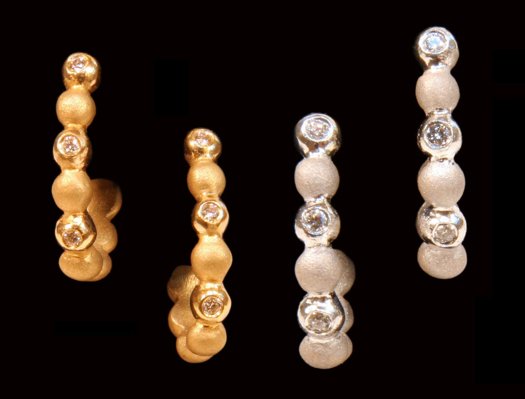 Huggie Hoop Earrings-14K Gold with Dots of Diamonds.