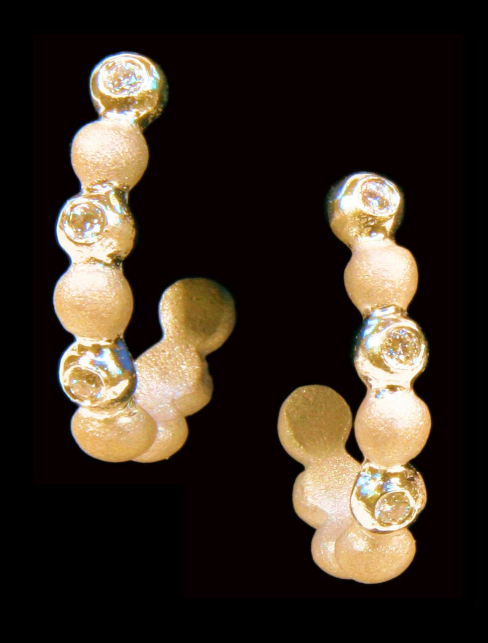 Huggie Hoop Earrings-14K Gold with Dots of Diamonds.