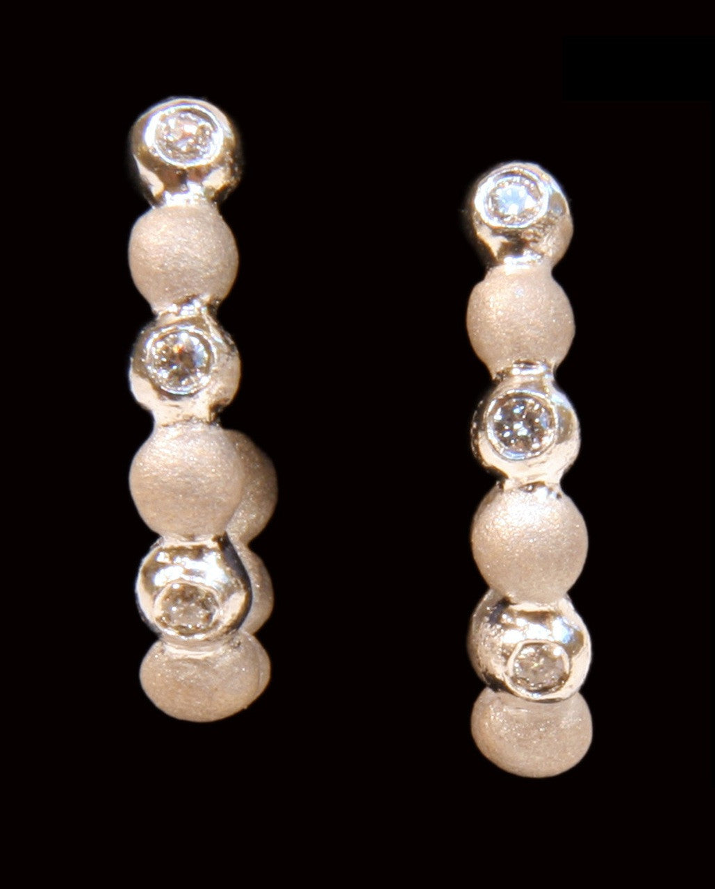 Huggie Hoop Earrings-14K Gold with Dots of Diamonds.